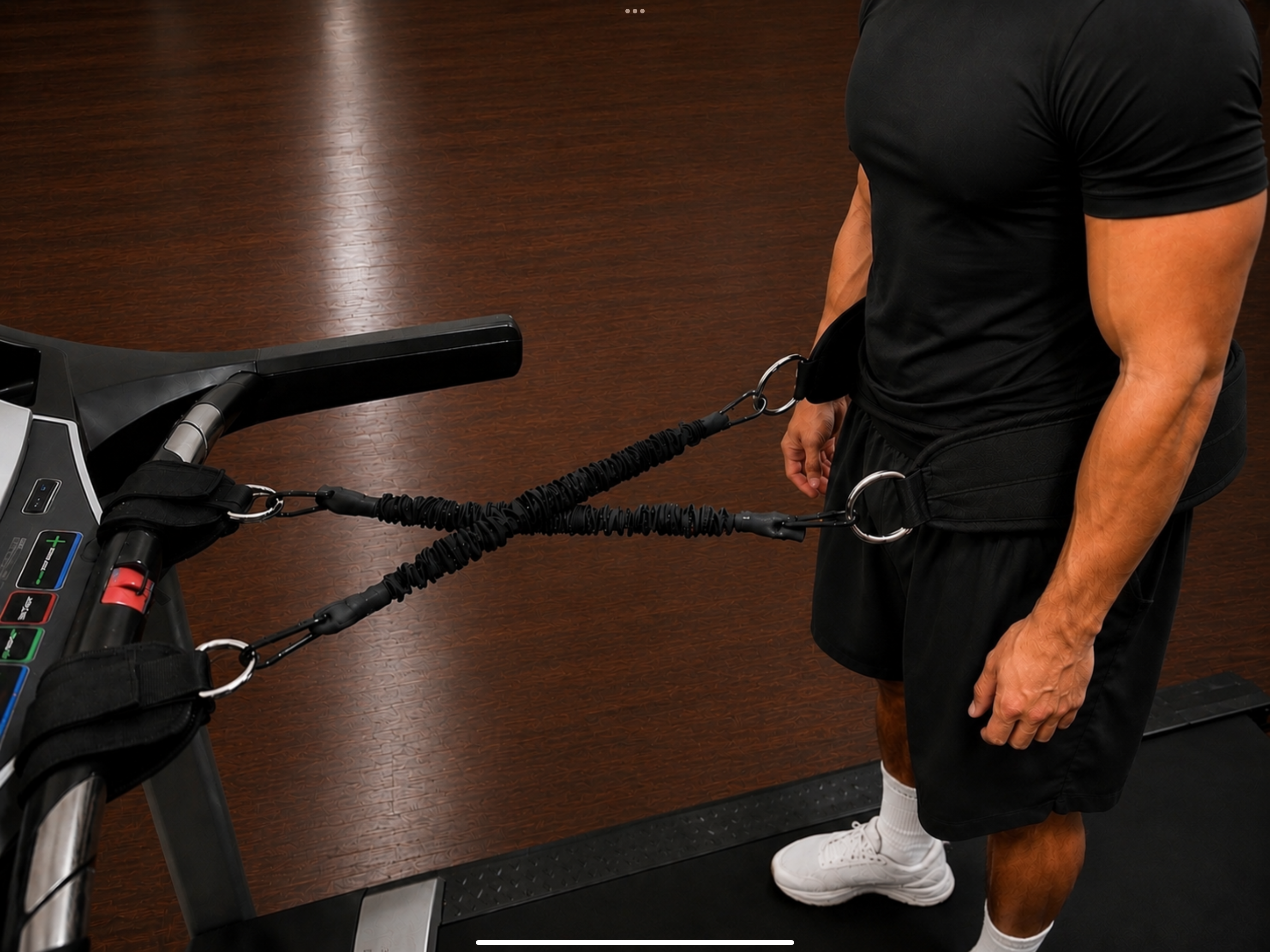 Person wearing the Stable Stepper Frat Black treadmill support belt while walking on a treadmill.
